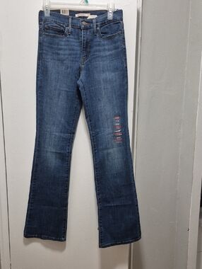 Levi's Dark Blue Flare Jeans with Subtle Distress